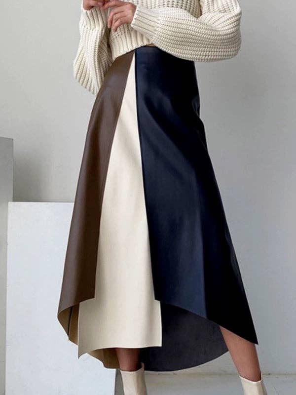 COLORÉ Jupe asymétrique à haut taille, coupe évasée, devant fendu et couleurs contrastées en vente sur Faire8