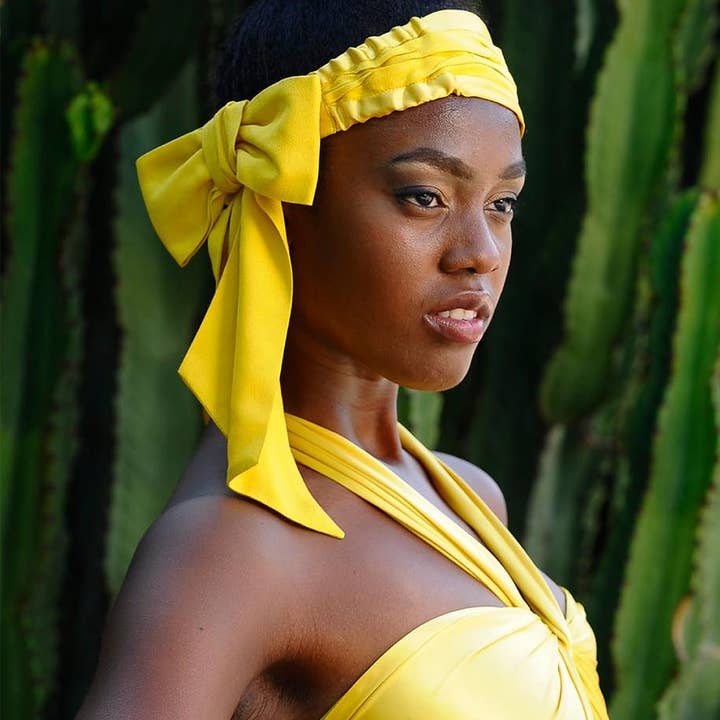 Giallo canarino Cerchietto Miami Crepe con fiocco in vendita all'ingrosso su Faire0