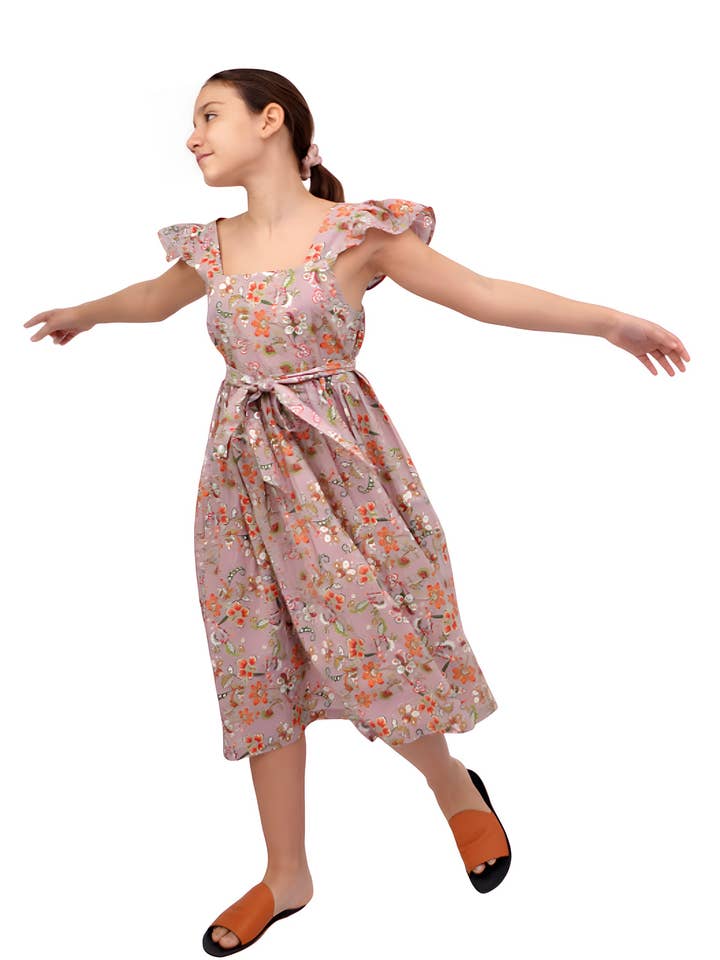 Abito da bambina con stampa floreale fatto a mano con schiena scoperta per la vendita all'ingrosso da parte di Kalimera Clothing Athens