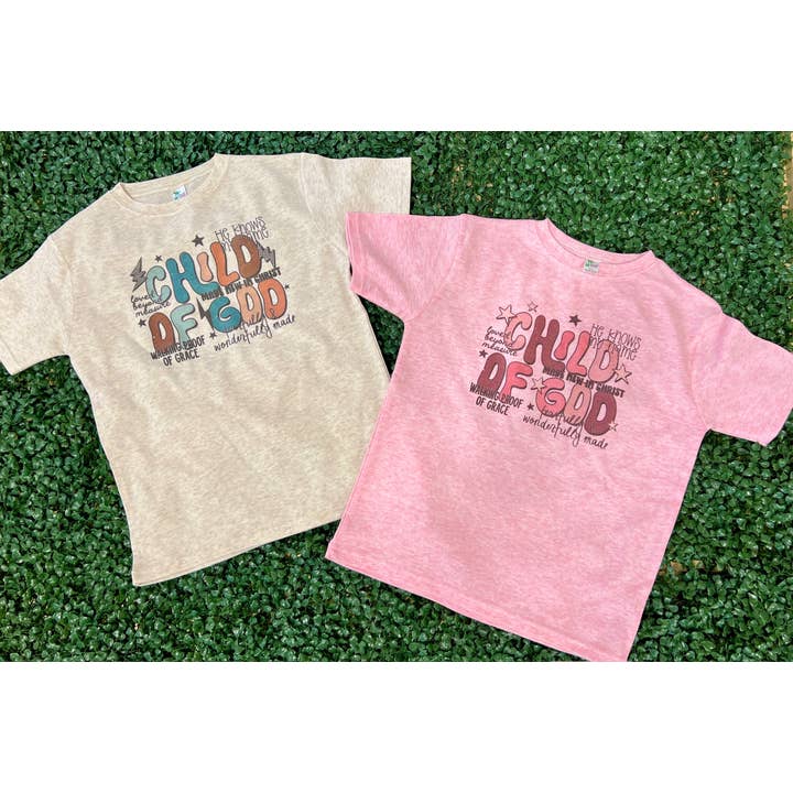 Child of God Youth Tee on Laughing Giraffe Pink or Oatmeal for wholesale by RMN Wholesale