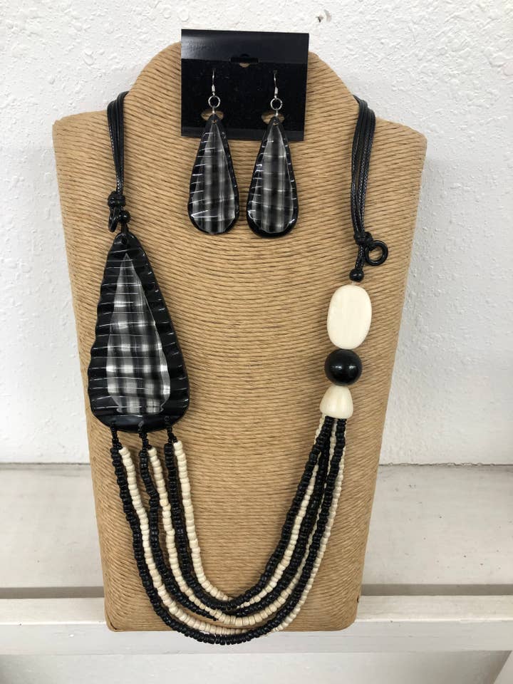 4-STRÄNGIGE SCHWARZE VERSTELLBARE WACHSSCHNUR MIT SCHWARZER UND WEISSER WOLLE für den Großhandel von International Duru's