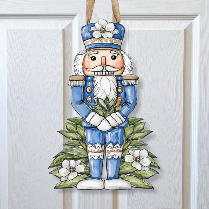 Blue Magnolia Nutcracker Door Hanger-Merry Christmas Holiday for wholesale by Home Malone