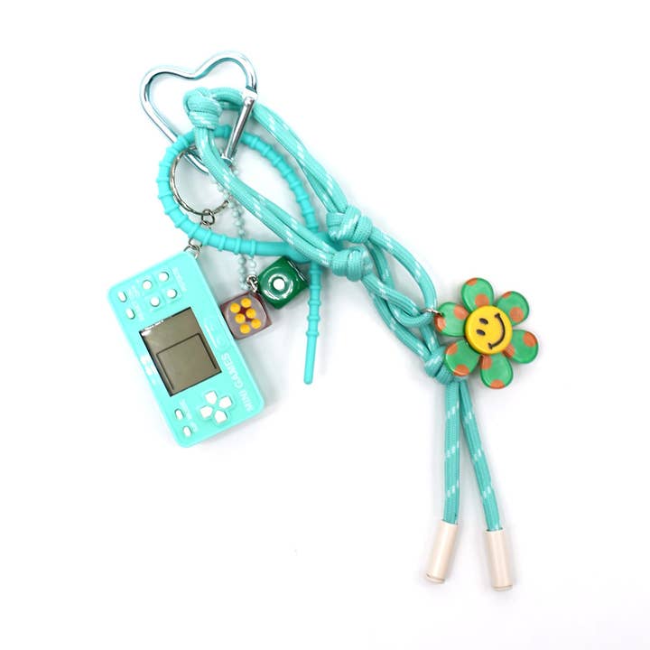 Vimoda – Großhandel Geldbörsen-/Taschenzubehör – Damen – Taschenanhänger – MINI SPIEL7