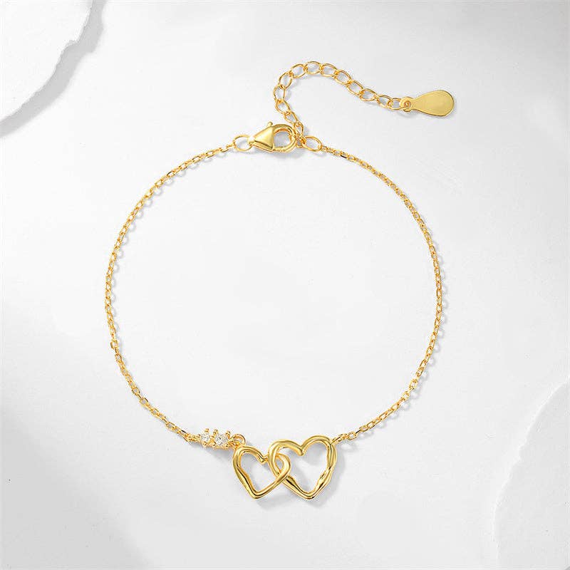 Perimade & Co. LLC - Wholesale Charm/Dangle Bracelet - Tiny Gold Interlocking Heart Bracelet in 925 Sterling Silver1