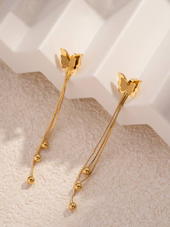 Refined Golden Butterfly Earring in Stainless Steel for wholesale by COSMOS