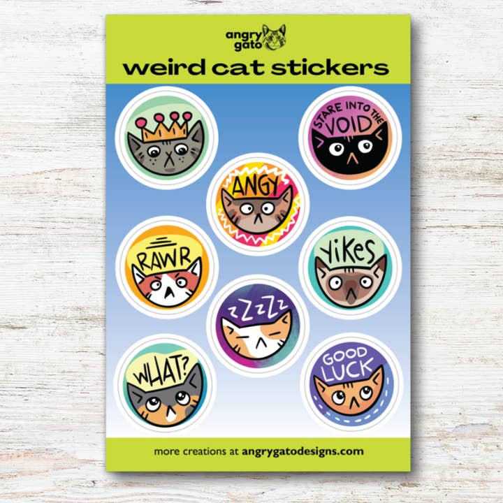 Weird Cat Sticker Sheet with 8 one-inch stickers for wholesale by Angry Gato Designs
