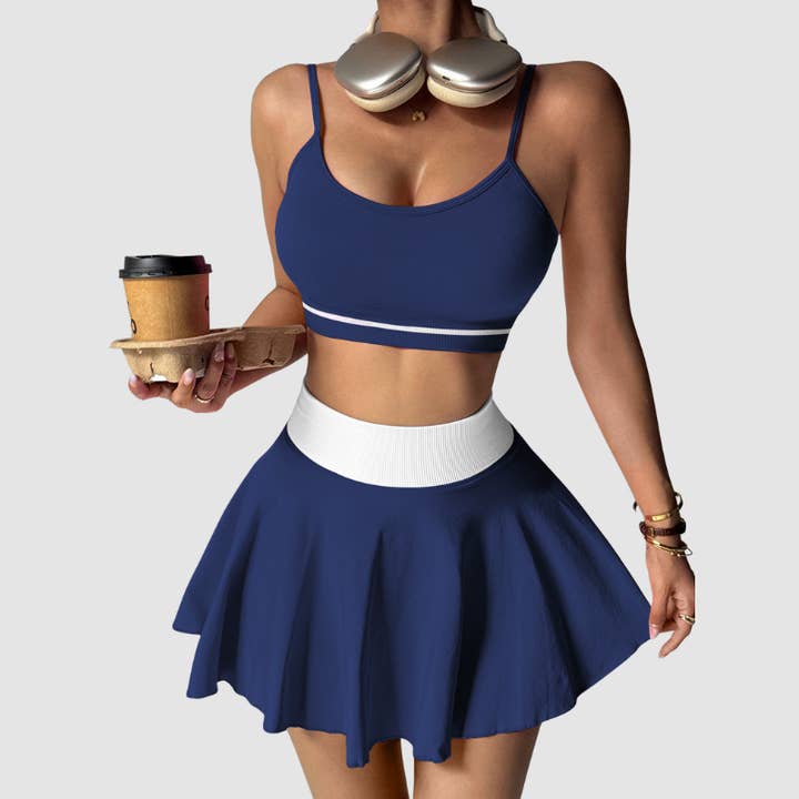 Sujetador deportivo de color contrastante al por mayor + falda de retazos para venta al por mayor de WONDERXFANS