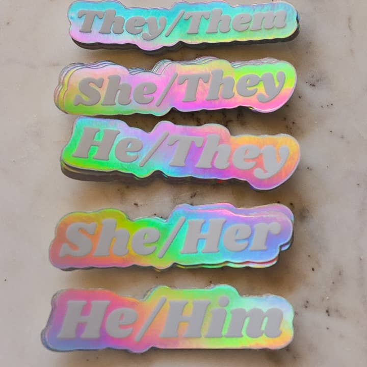 Holographic Pronoun Sticker for wholesale by Little Viper Co
