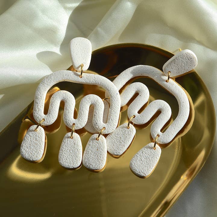 The Athena | Sandy Speckled White Clay Chandelier Earrings for wholesale by Clay Jewels by Jules
