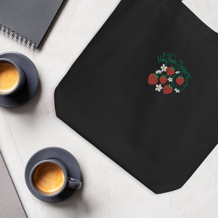 Sweet Thing Embroidered Organic Black Strawberry Tote Bag for wholesale by French Rain, Inc.