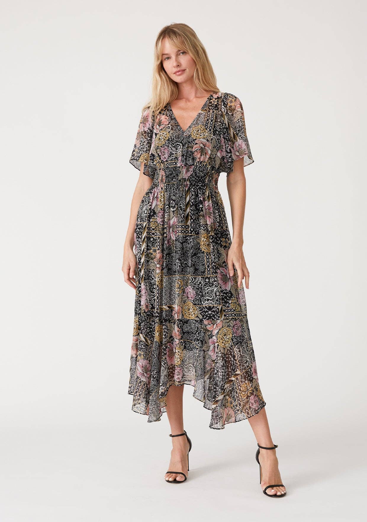 Black Dusty Peach Flowy Asymmetrical V Neck Smocked Maxi Dress for wholesale on Faire