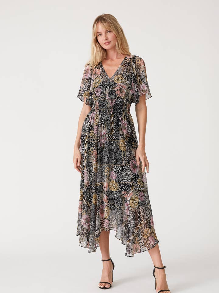 Black Dusty Peach Flowy Asymmetrical V Neck Smocked Maxi Dress for wholesale on Faire0