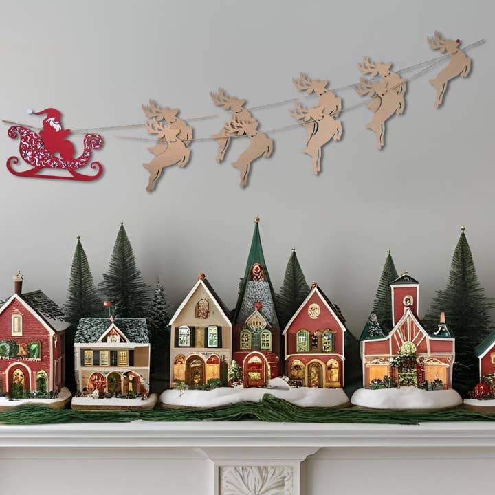 La guirlande de traîneau du Père Noël et de rennes pour la vente par The Creative Garland Company