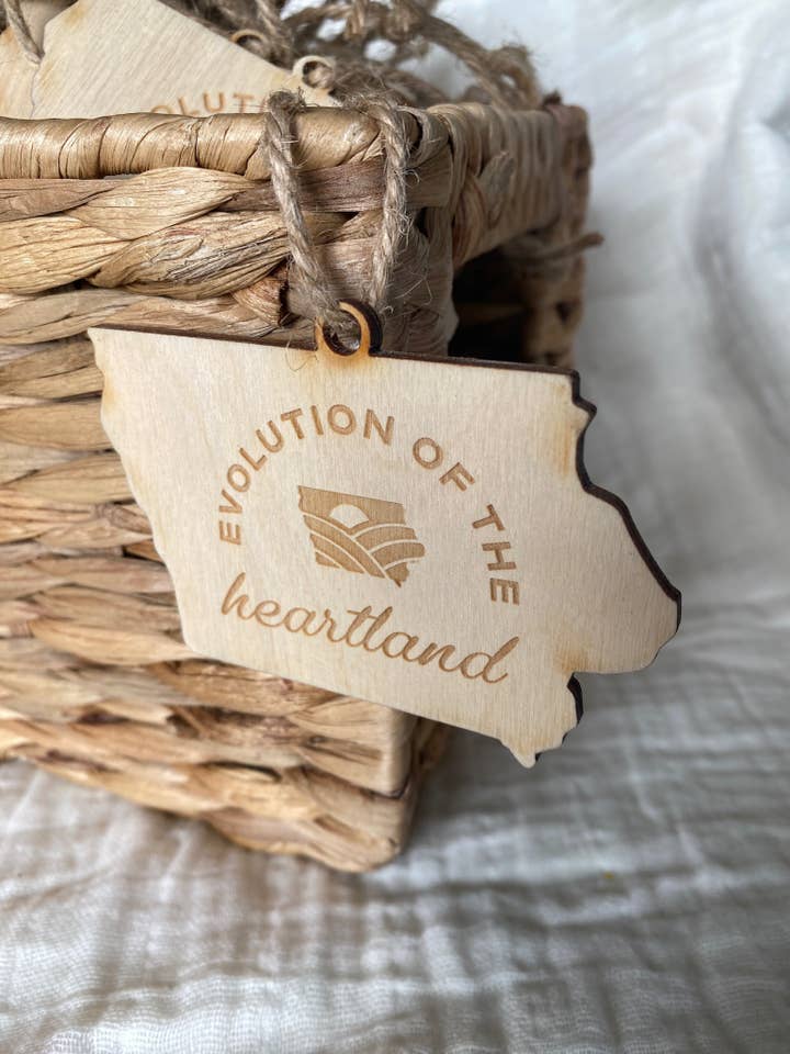 Evolution of the Heartland Christmas ornament for wholesale by Ignite: Be the Light