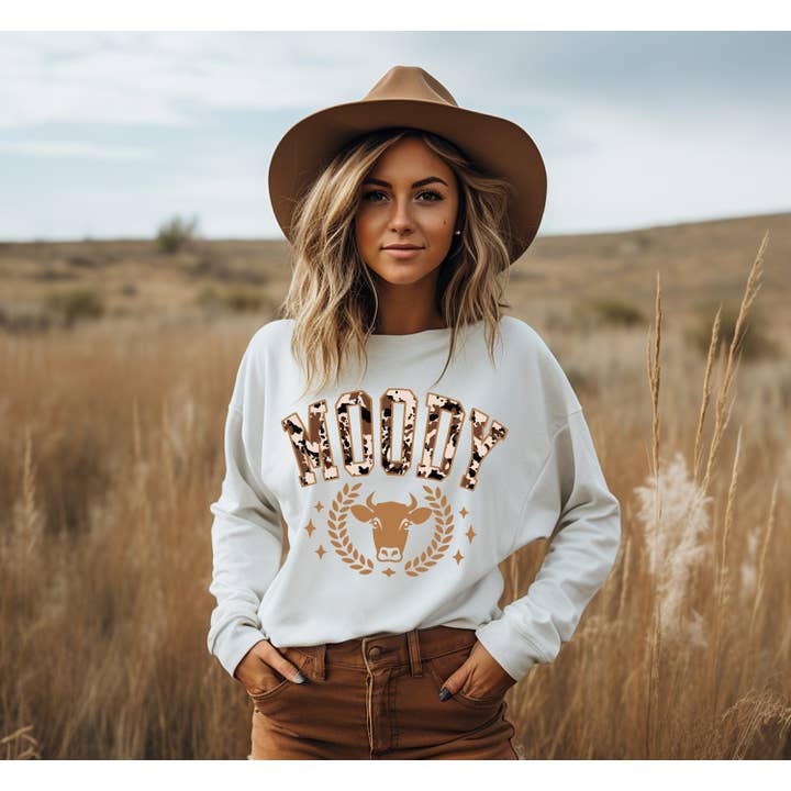 Moody Varsity Cow Crew Neck Sweatshirt for wholesale by Amy Anne Apparel Inc
