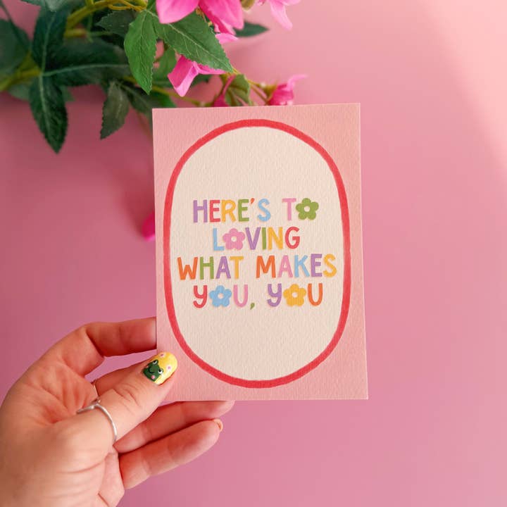 Here's To Loving What Makes You, You Postcard for wholesale by The Happy Badger