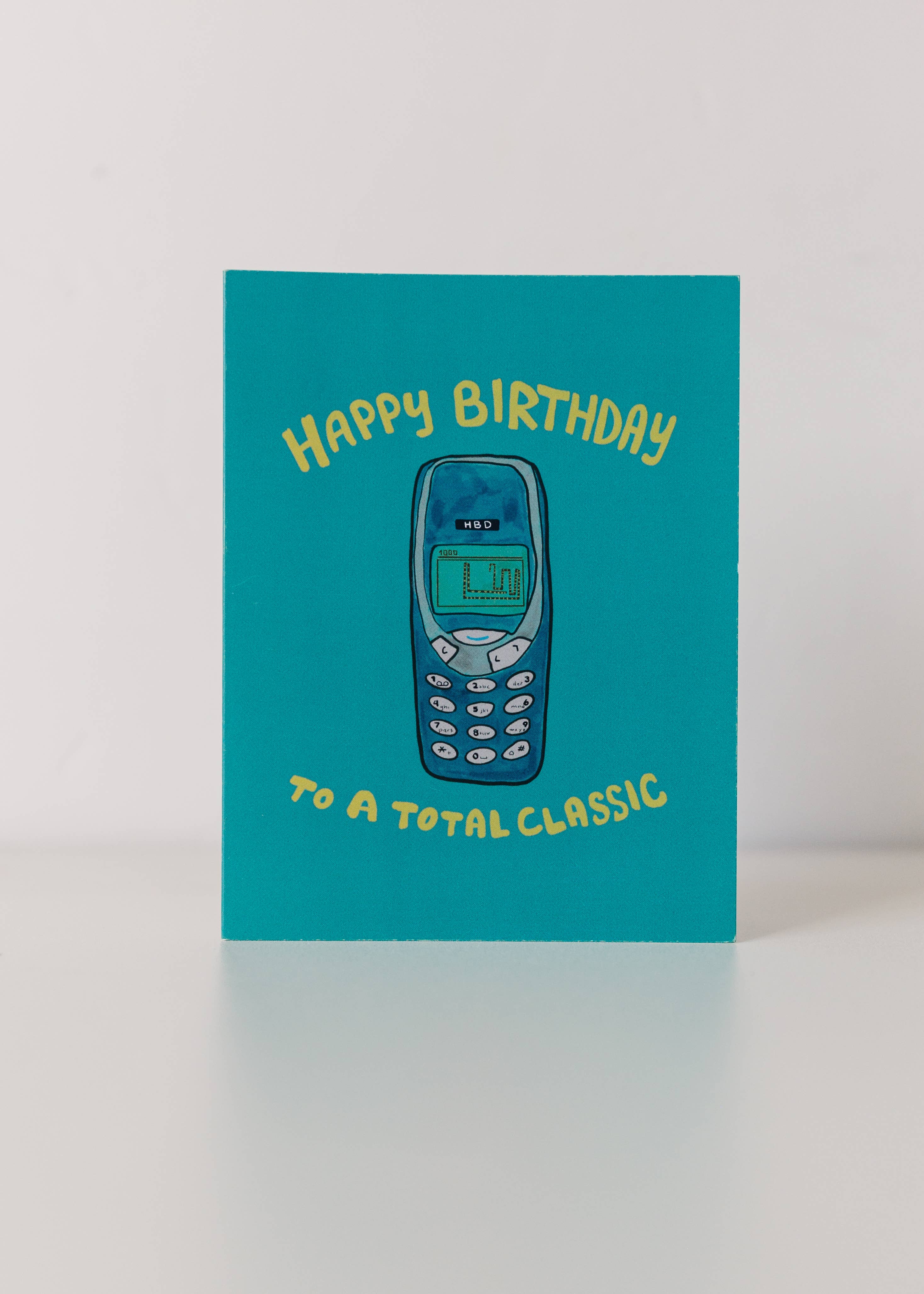 Marigold Press - Vendita all'ingrosso Biglietti di auguri - Biglietto d'auguri retrò Nokia Snake anni 90/20003