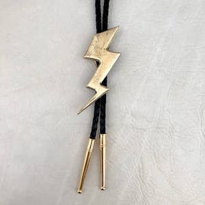 Purchase Wholesale bolo tie. Free Returns & Net 60 Terms on Faire