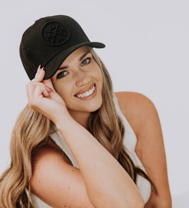 Black Mama X™ Blackout Premium Trucker Hat for wholesale on Faire