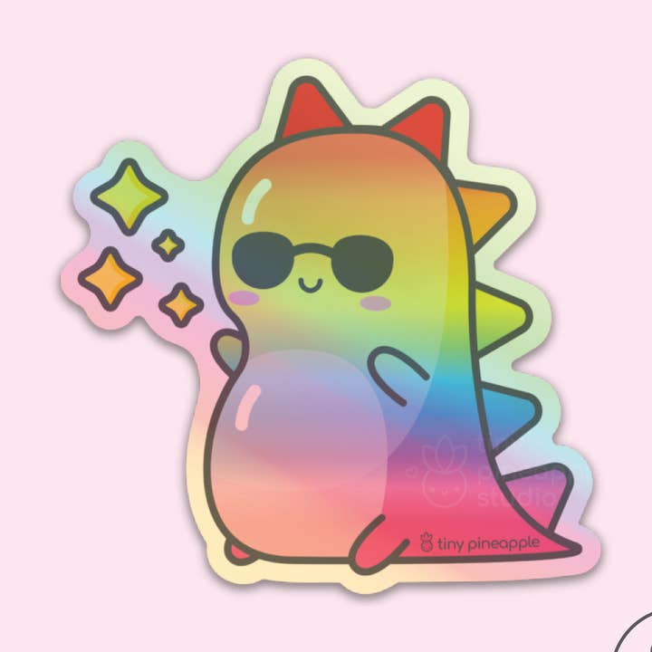PEGATINA DE VINILO HOLOGRÁFICA Rainbow Shiny Dino para venta al por mayor de Tiny Pineapple Studio