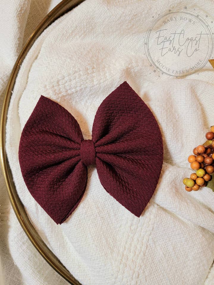 Nœud rouge à vin pour la vente par East Coast Kids