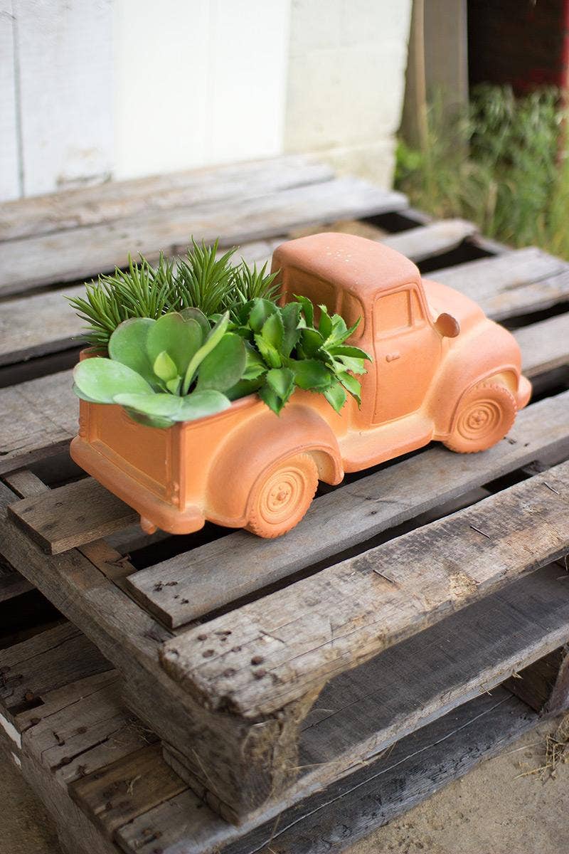 Orange CLAY TRUCK PLANTER for wholesale on Faire