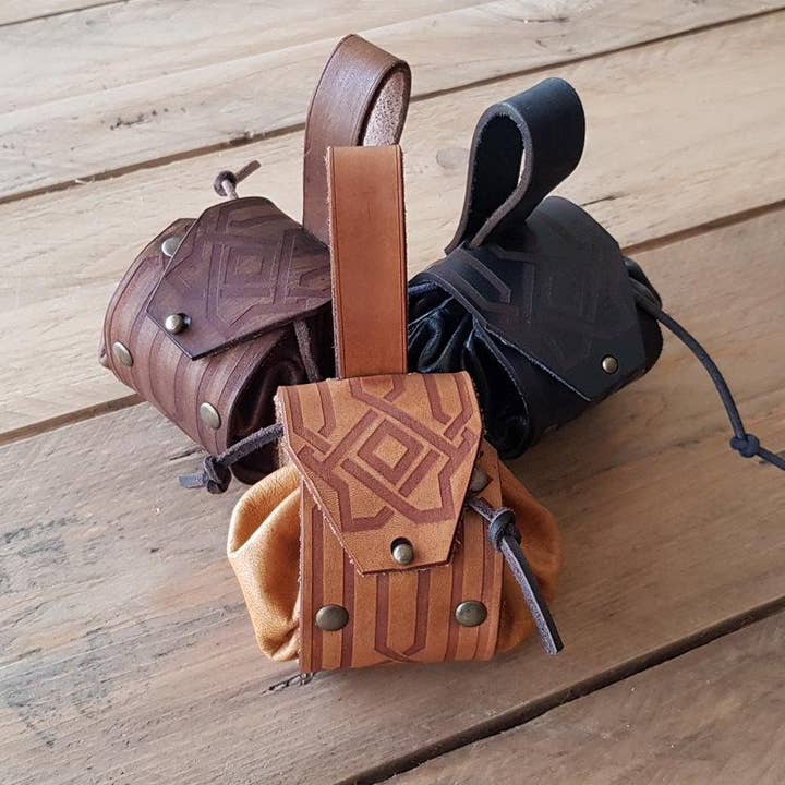 Decorated Leather coin or jewel pouch. for wholesale by Outcast Props