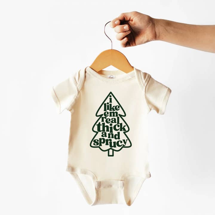 I Like Em Real Thick & Sprucy | 100% Cotton Baby Bodysuit or for wholesale by Wildflowers + Cotton