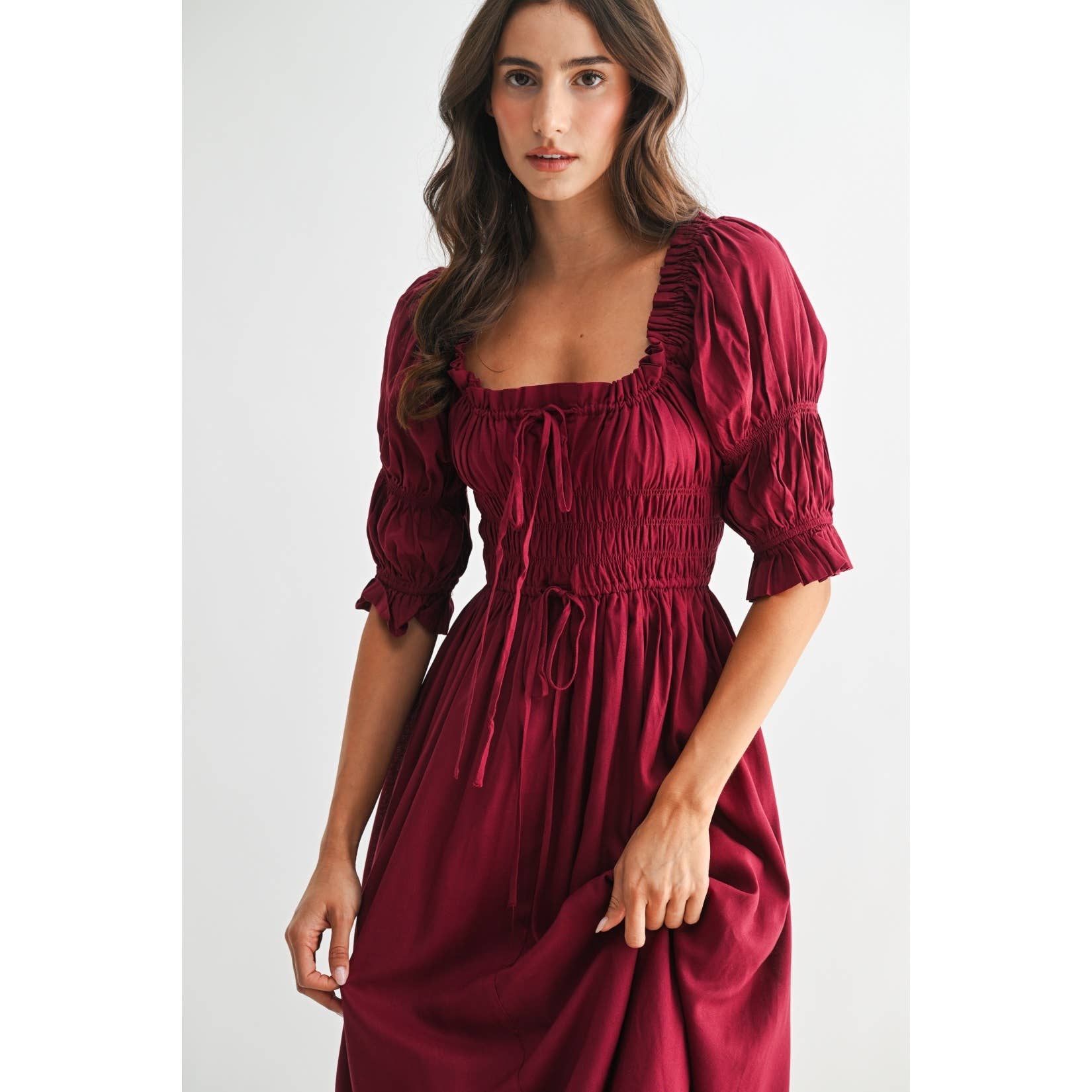 BURGUNDY OFF-SHOULDER SMOCKED MIDI DRESS WITH PLEATED SKIRT for wholesale on Faire1