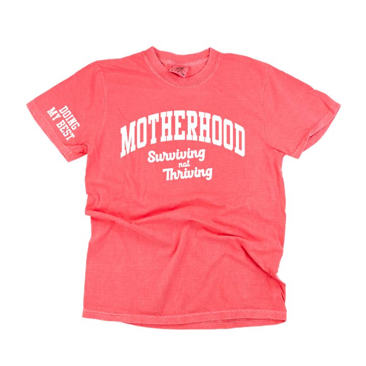 MOTHERHOOD - SURVIVING NOT THRIVING - DOING MY BEST - (Our 2024 Mantra) - Colors - LMSS® EXCLUSIVE - Short Sleeve Comfort Colors Tee for wholesale by Little Mama Shirt Shop
