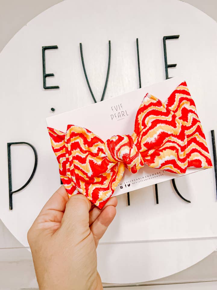Red Gold White ZigZag KC Print Baby Bow Turban for wholesale by Evie Pearl Handmade LLC