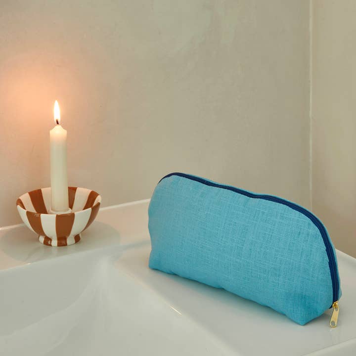 Bolsa de maquillaje de lino azul con forro de tela Liberty para venta al por mayor de Catherine Colebrook
