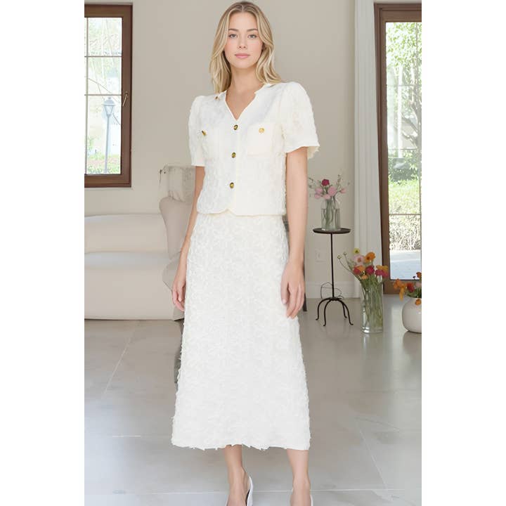 Ensemble haut à boutons et jupe à fleurs texturées pour la vente par XHHH Inc