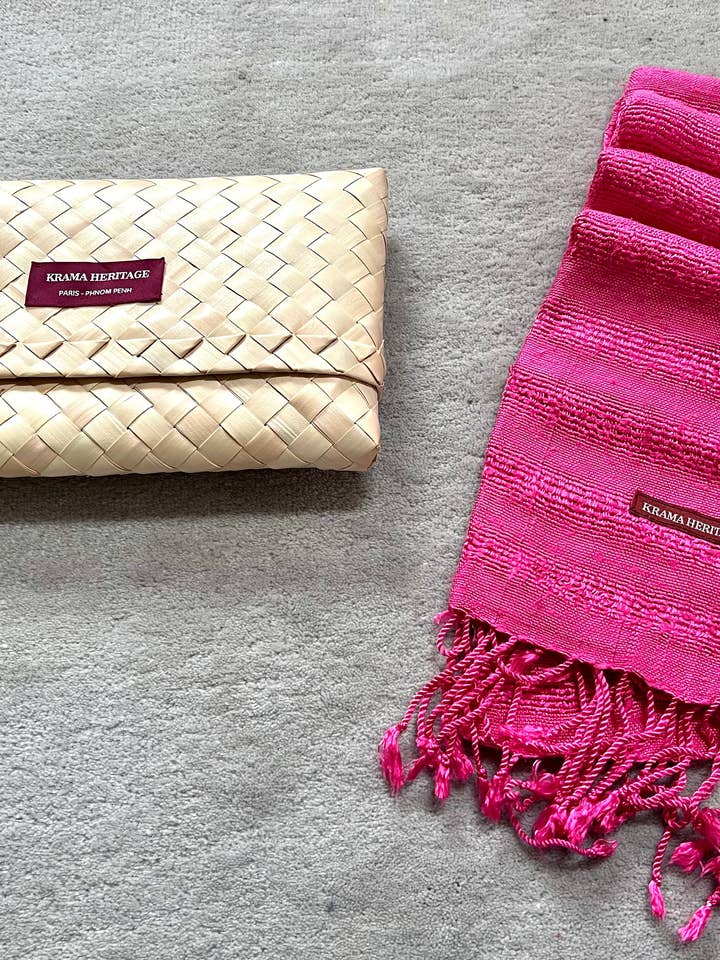 The Wavy Textured Fuchsia Krama in its palm leaf case - Women for wholesale by Krama Heritage