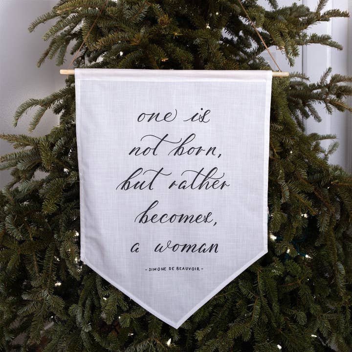 One is not born, but rather becomes, a woman Linen Banner for wholesale by Darling Spring