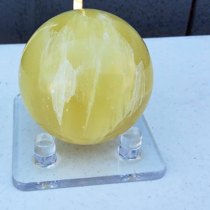 LEMON CALCITE SPHERES 60MM-65MM for wholesale by ZeeRocks