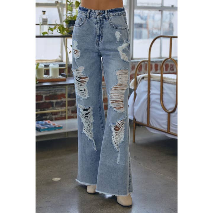 PANTALON EN JEAN AMPLE TAILLE HAUTE VIEILLI pour la vente par Apolline