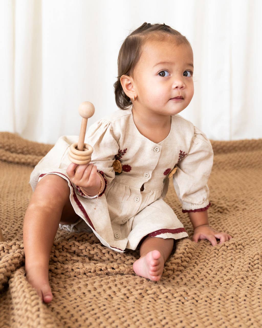 Natural Ravello Embroidered Baby Dress & Bloomer (Linen Blend) for wholesale on Faire7