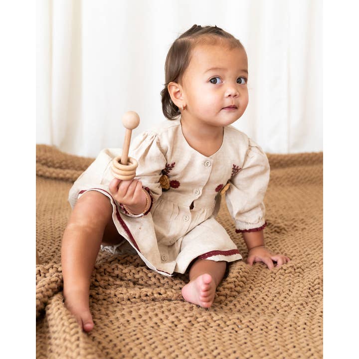 Natural Ravello Embroidered Baby Dress & Bloomer (Linen Blend) for wholesale on Faire7