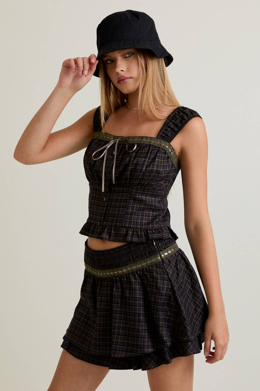OLIVE NAVY PLAID SLEEVELESS TOP WITH TRIM DETAIL WITH MID RISE SKIRT for wholesale on Faire2