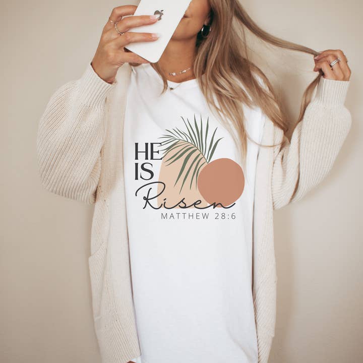 Boho He is Risen Easter Graphic Tee | Women's Tees for wholesale by Amy Anne Apparel Inc