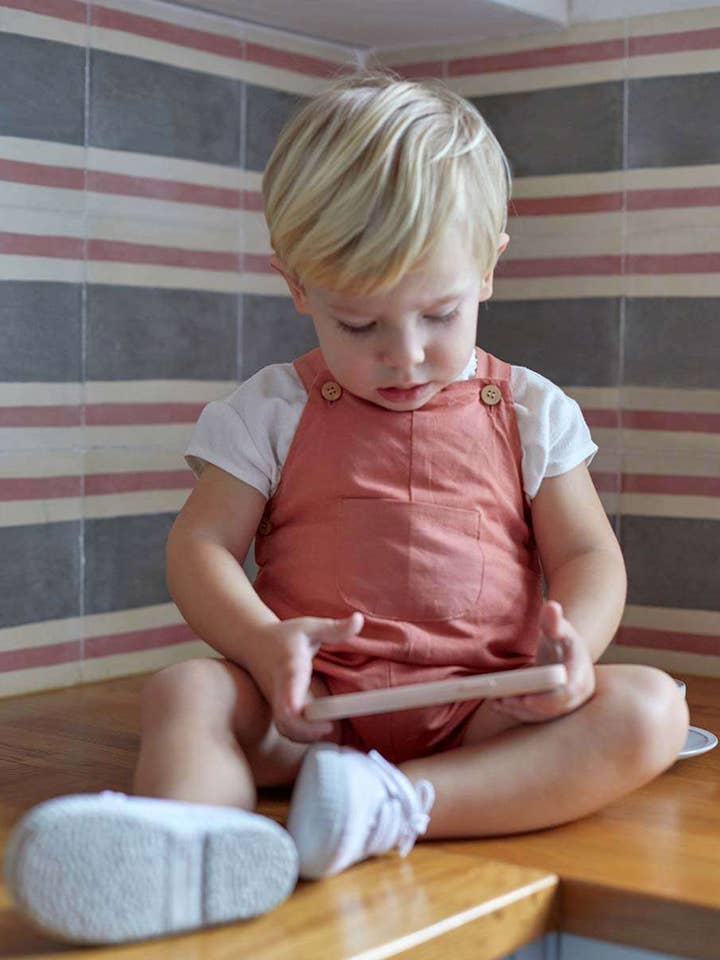 Kort savlesmæk til dreng med frontlomme for engroshandel hos Dadati