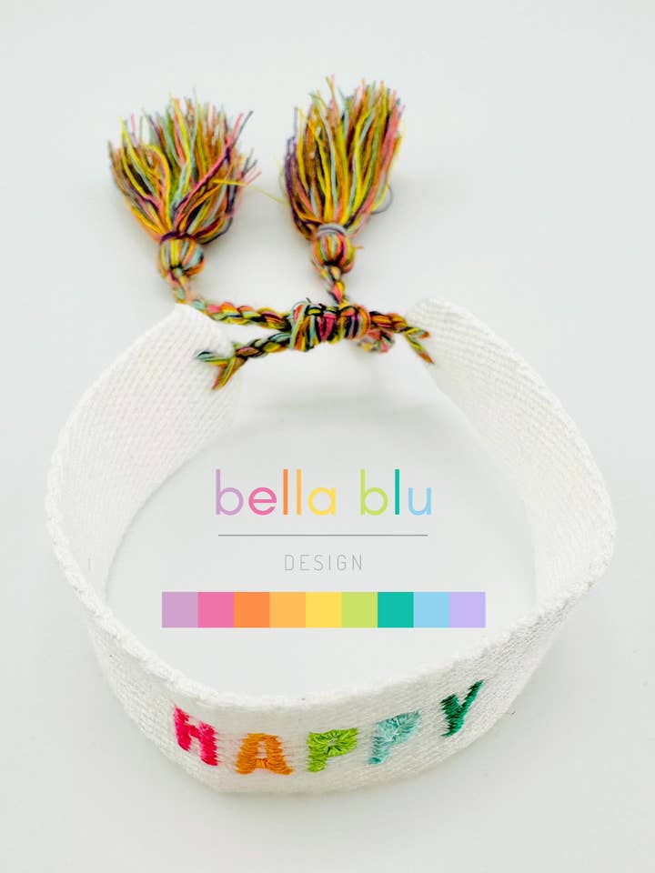 Happy woven bracelet in white with colorful letters adjustable for wholesale by Bella Blu Designs