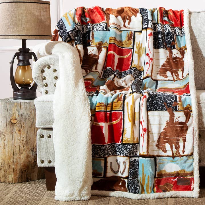 Wrangler® Vintage Western Plush Sherpa Throw for wholesale by Carstens, Inc.