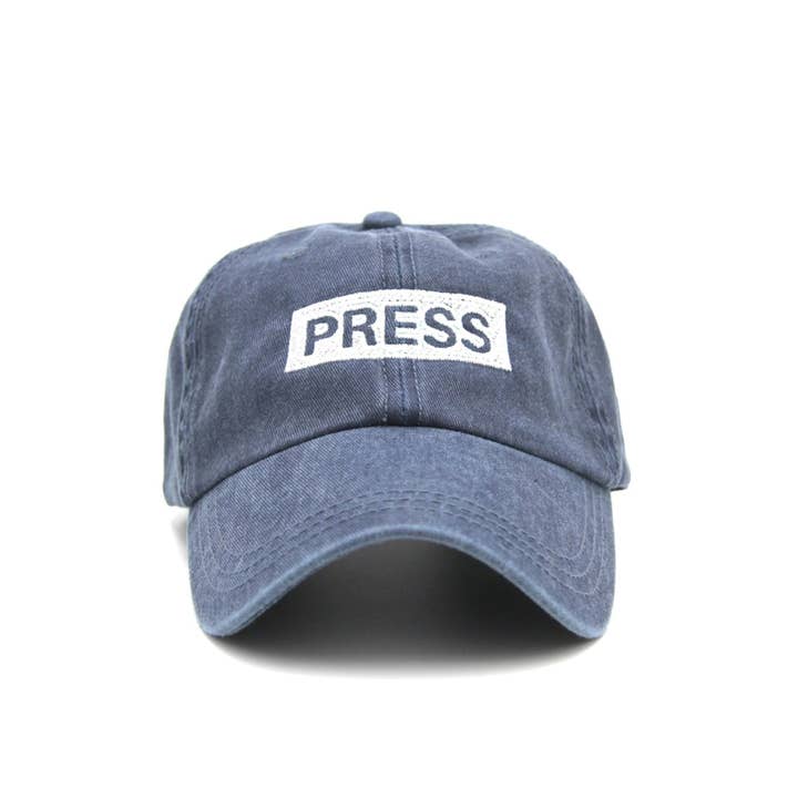 Press Cap for wholesale by Wear The Peace