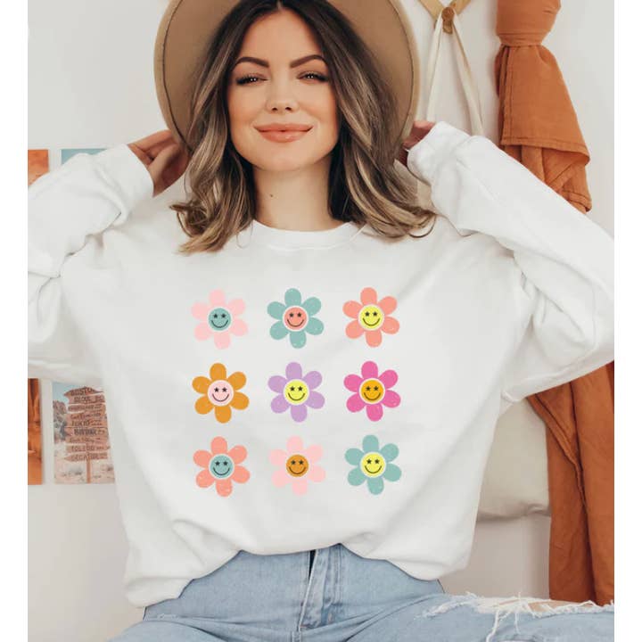 Sweat-shirt Smiley Face Daisies pour femme. pour la vente par The Intentional Shop