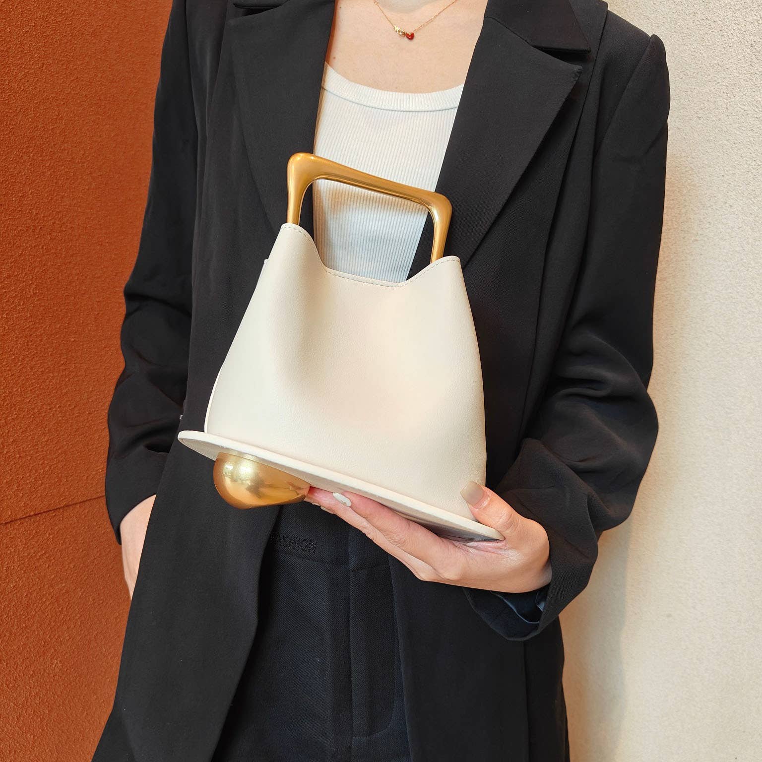 Sook Stainable – wholesale Top handle bag – women's – Geometric Artistic Design Metal Handle Leather Bag12