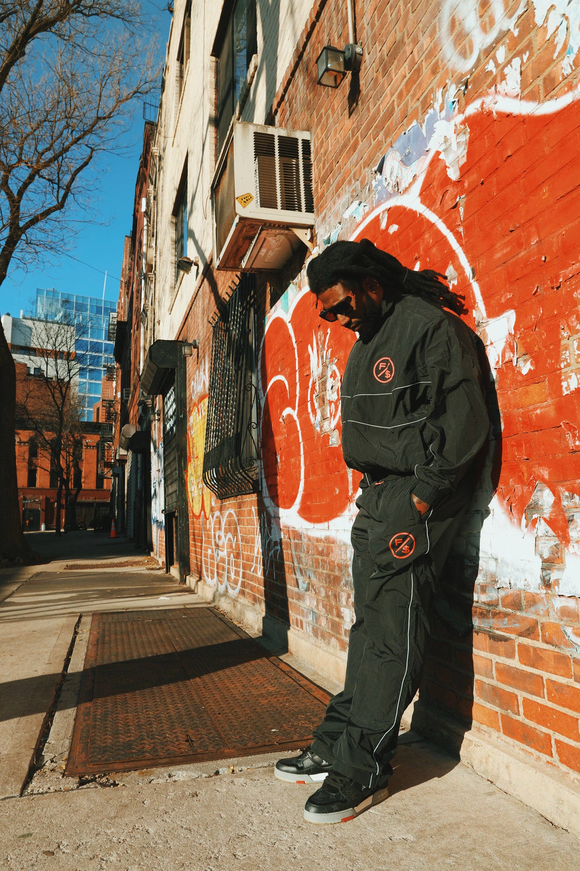 Black Red MOTION Nylon Pants (BRED) for wholesale on Faire5