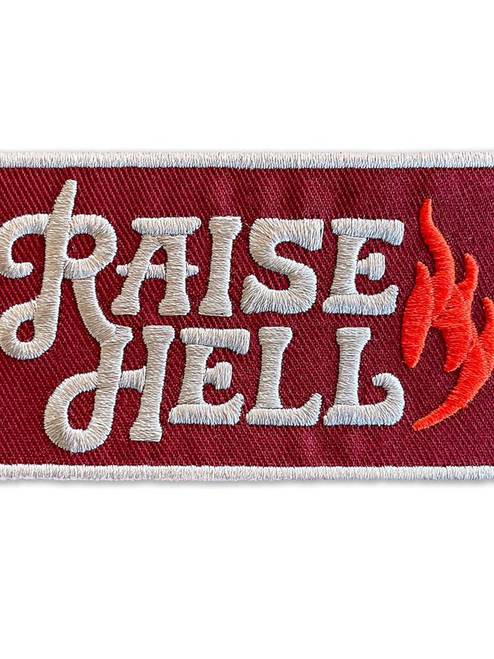 Raise Hell Embroidered Iron-On Patch for Hats 3.5" x 2 for wholesale by Giant Step Design Co.