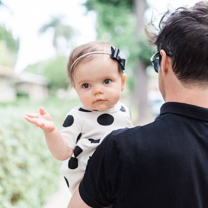 Black Faux Leather Bow Headband for wholesale by Roses and Polkadots Boutique